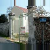 Wrought iron entrance gate with stone posts - Reference 1210 Width 14' 5'' ¼ Height 12' 5'' ⅝ Wrought iron entrance gate with stone posts - Reference 1210 Width 14' 5'' ¼ Height 12' 5'' ⅝