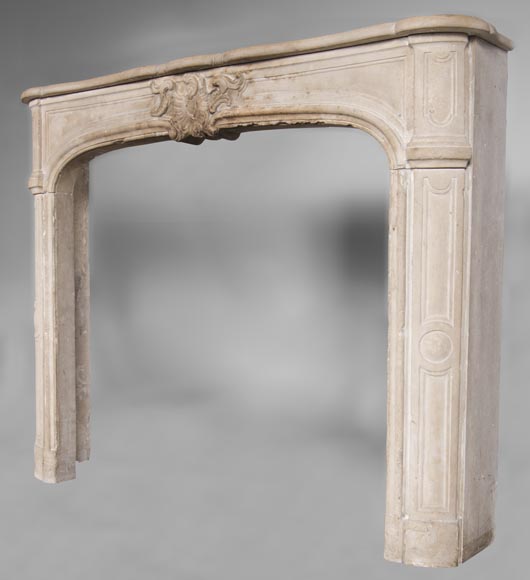 An Antique Louis Xv Style Fireplace Made Out Of Stone With Large