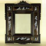 Mirror with putti, enameled grisaille on gold base and blackened wood - Reference 9214&nbsp;Width&nbsp;2' 1'' ⅝&nbsp;Height&nbsp;2' 7'' ⅛