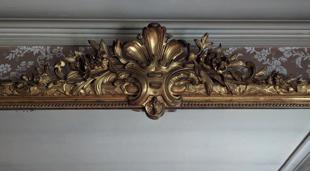 Large Regence style gilded trumeau surmounted by a palm leaf-1