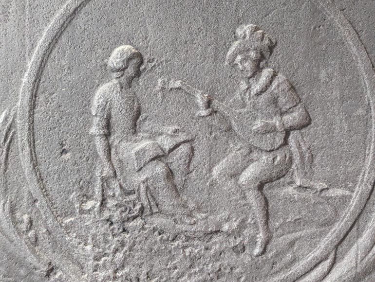 Louis XVI style fireback with lute player-1