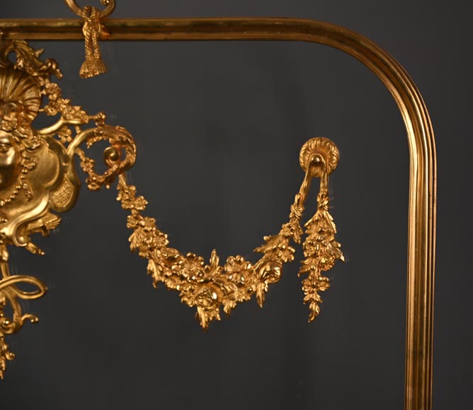 Napoleon III style fireback with woman's mask and garland of flowers in gilded bronze and glass.-4