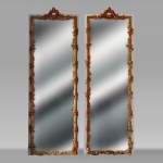 Pair of Napoleon III style mirrors decorated with garlands of flowers