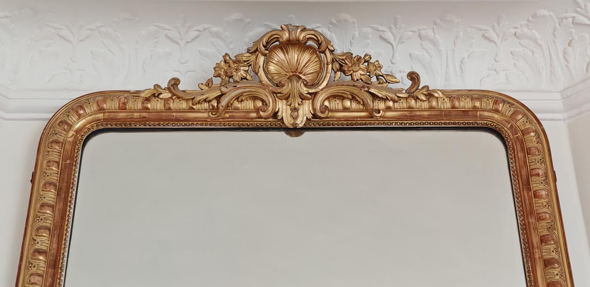 Gilded Louis XV style trumeau topped by an openwork shell-1