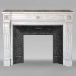 Louis XVI style mantel with sunflower blossom in Carrara marble