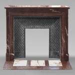 Louis XIV style Bolection mantel in Rouge Griotte marble