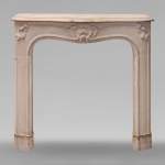 Curved Louis XV style stone mantel