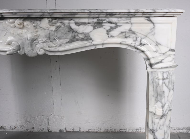 Louis XV style Arabescato marble mantel adorned with an asymmetrical palmette-10