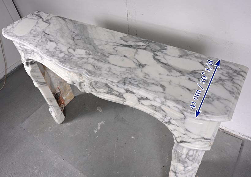 Louis XV style Arabescato marble mantel adorned with an asymmetrical palmette-12