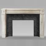 Louis XVI style mantel in statuary marble adorned with a string of pearls