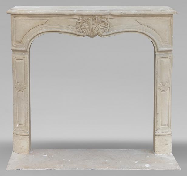 Louis XV style mantel adorned with a carved stone palmette-0