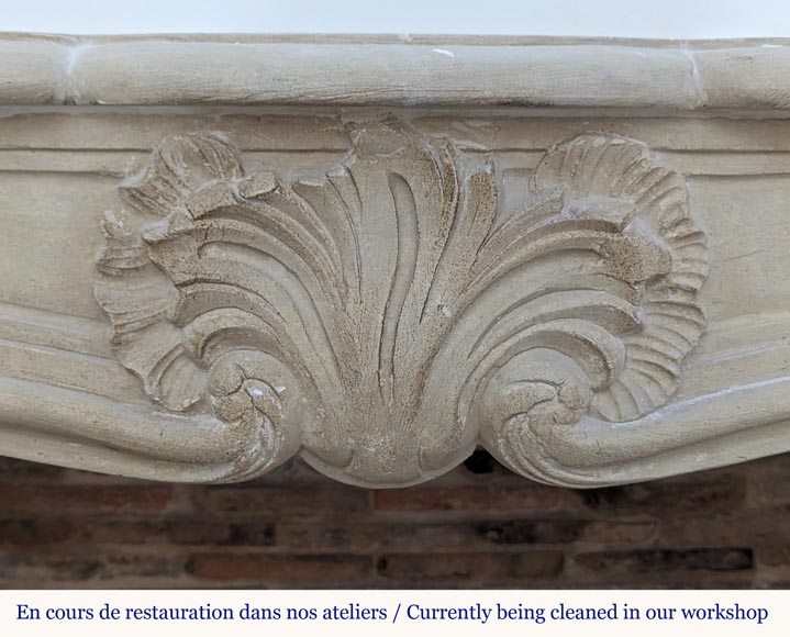 Louis XV style mantel adorned with a carved stone palmette-1
