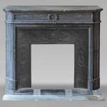Louis XVI style mantel with rounded corners carved in Turquin marble
