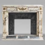 Louis XVI style bronze mantel in Panazeau marble