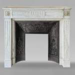 Louis XVI style Carrara marble mantel with curved fluting