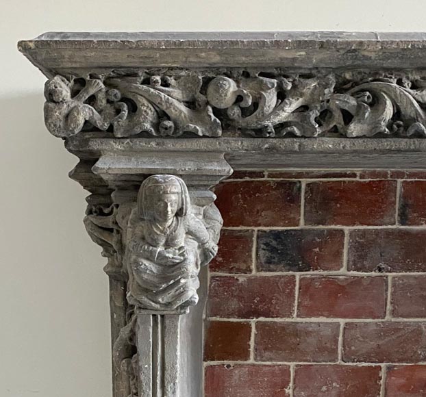 Gothic period stone mantelpiece with monsters and carved capitals-3