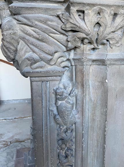 Gothic period stone mantelpiece with monsters and carved capitals-8