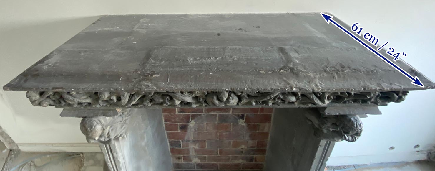 Gothic period stone mantelpiece with monsters and carved capitals-13