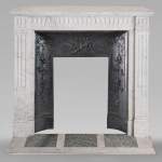 Louis XVI style Carrara marble mantel with curved flutes
