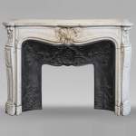 Louis XV style Carrara marble mantel with palmette motif