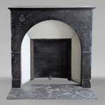 Restoration period arched mantel in black spotted marble