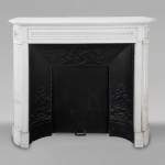Louis XVI style Carrara marble mantel with rounded corners and pearl décor