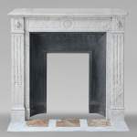 Louis XVI style Carrara marble mantel with sunflowers and fluted legs