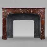 Regence style mantel carved in Griotte red marble