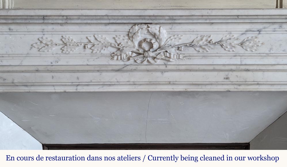 Round Louis XVI style mantel in Carrara marble adorned with a laurel wreath-1