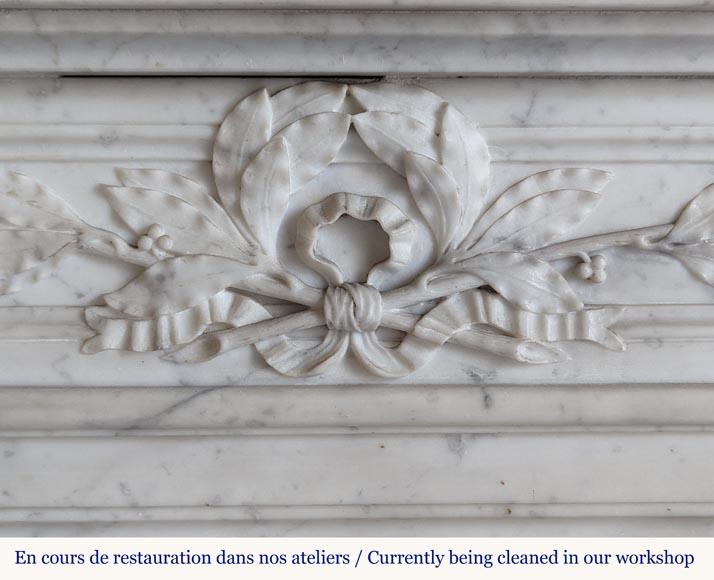 Round Louis XVI style mantel in Carrara marble adorned with a laurel wreath-2