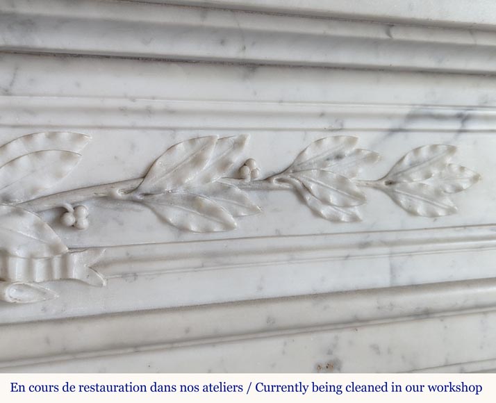 Round Louis XVI style mantel in Carrara marble adorned with a laurel wreath-3