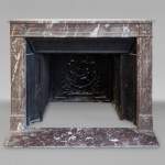 Louis XVI style mantel in Northern Red marble adorned with rosettes