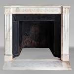 Louis XVI style statuary marble mantel with pilaster capitals and macaroons