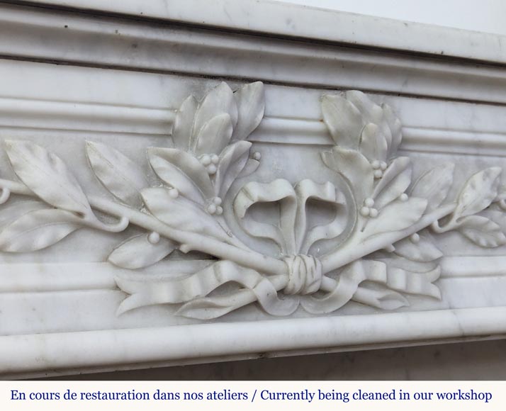 Louis XVI style Carrara marble mantel adorned with a laurel wreath-3