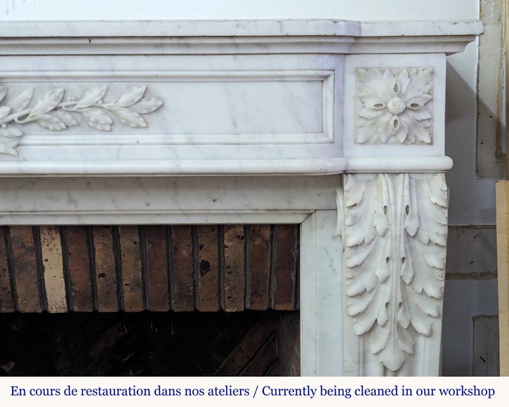Louis XVI style Carrara marble mantel adorned with a laurel wreath-10