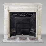 Louis XVI style mantel in Carrara marble adorned with rosettes