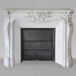 Louis XV style Carrara marble mantel decorated with foliate shells