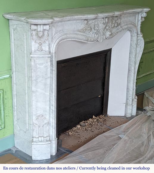 Louis XV style Carrara marble mantel decorated with foliate shells-5