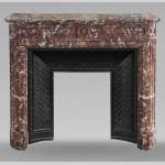Louis XVI style mantel in Rouge du Nord marble