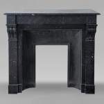 Napoleon III style mantel in black speckled marble with modillions