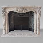 Large Louis XV style curved and finely carved Sarrancolin marble mantel