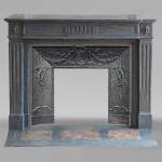 Louis XVI style mantel with curved flutes adorned with rosettes carved in Turquin marble
