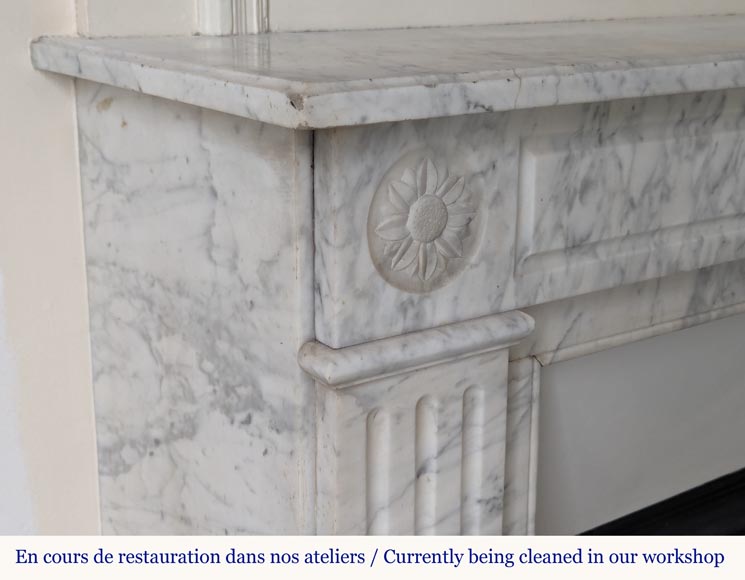 Louis XVI style mantel in veined Carrara marble with flower adorned heads-3