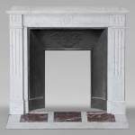 Louis XVI style mantel in Carrara marble adorned with a sunflower