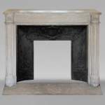 Louis XVI style mantel with half-columns and Greek frieze carved in stone