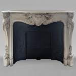 Louis XV style mantel in Carrara marble richly carved with foliage
