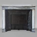 Louis XVI style two-tone mantel carved in Carrara and Turquin marble