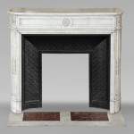 Louis XVI style Carrara marble mantel with rounded corners adorned with a sunflower flower