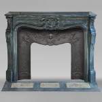 Louis XV style Turquin marble mantel with palmette motif