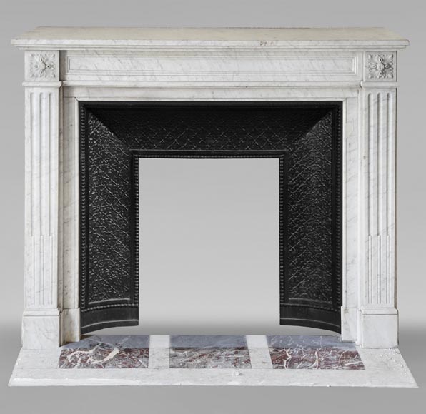 Louis XVI style mantel in veined Carrara marble adorned with rosettes-0